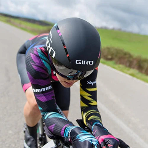 Person riding with an aerodynamic helmet