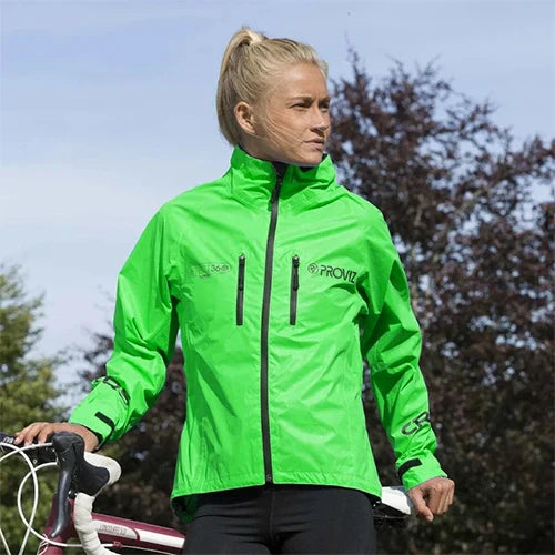 Person wearing a jacket while cycling outside