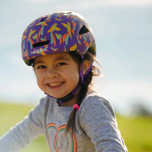 Young child wearing a bike helmet
